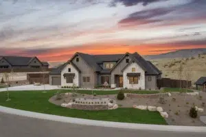 Sunset photo of The Smyth home exterior at 11040 N Elk Ridge Way in The Highlands at Cartwright Ranch Community located in Boise, Idaho
