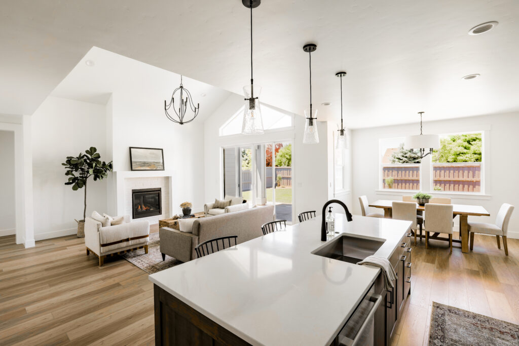 Open-concept kitchen, dining, and great room in an Alturas Homes interior—designed for entertaining and everyday living in Idaho.